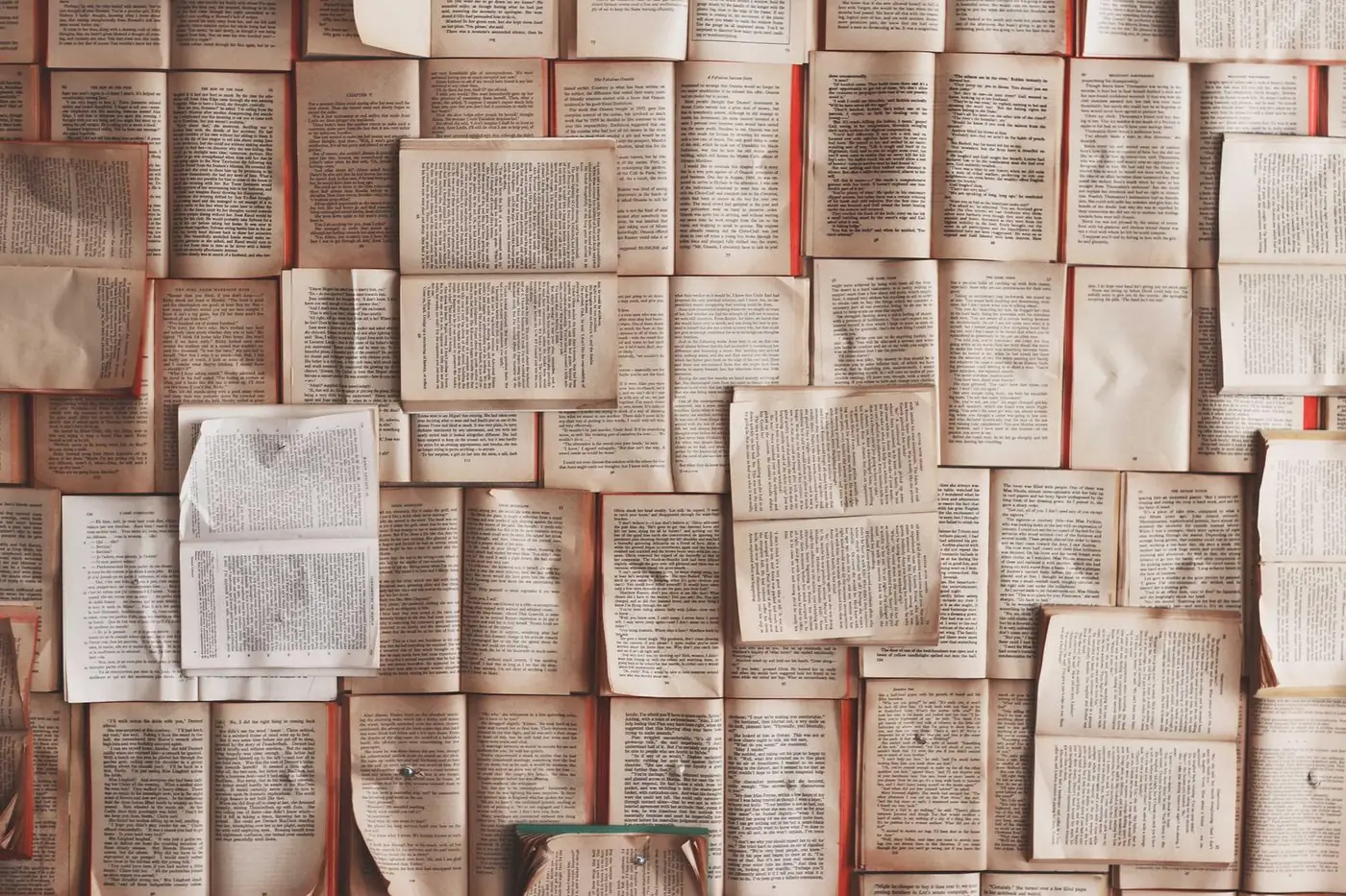 Open book pages forming a textured wall